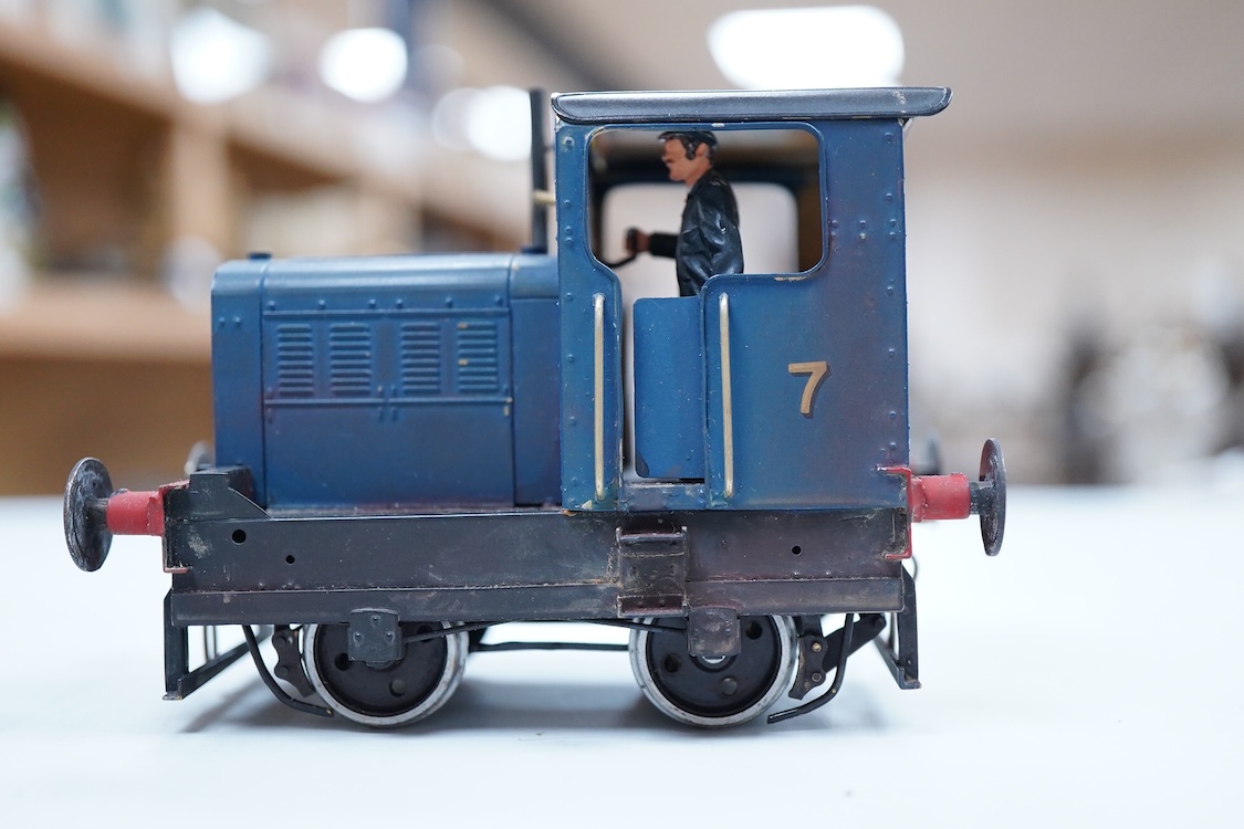 A narrow gauge scratch built model railway locomotive running on 32mm track by John Worsley, a Ruston 0-4-0 diesel shunter, 7, a detailed model with sprung buffers, etc. and fitted with a Mashima 12v dc motor, for two ra